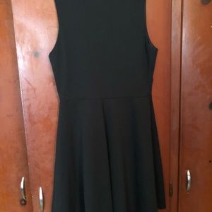 Foreign Exchange. Black short dress. Size Large.